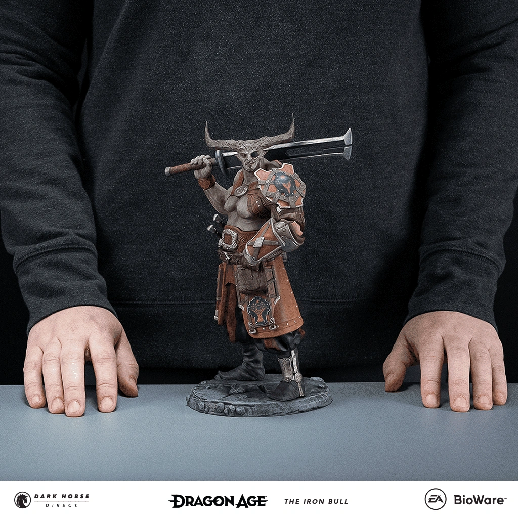 The Iron Bull statuette in front of a person for scale.