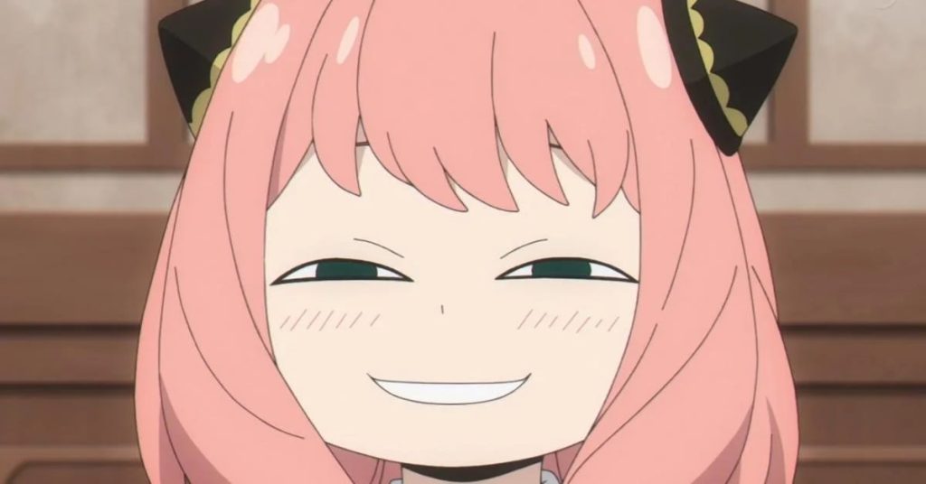 'Spy x Family' anime screenshot depicting Anya's attempt at a "sincere" smile.