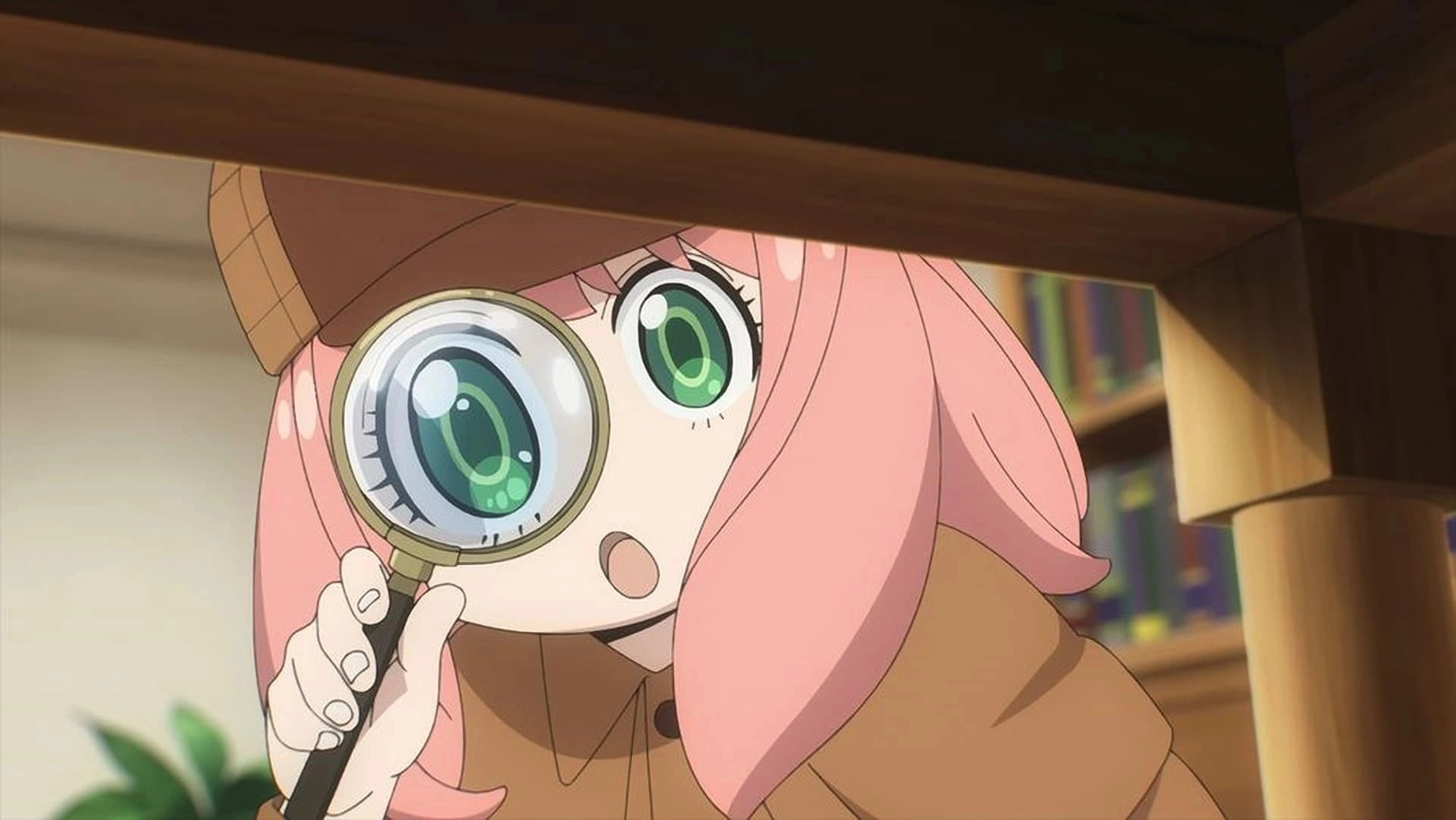 Spy x Family screenshot showing Anya peeking through a magnifying glass in her detective outfit.