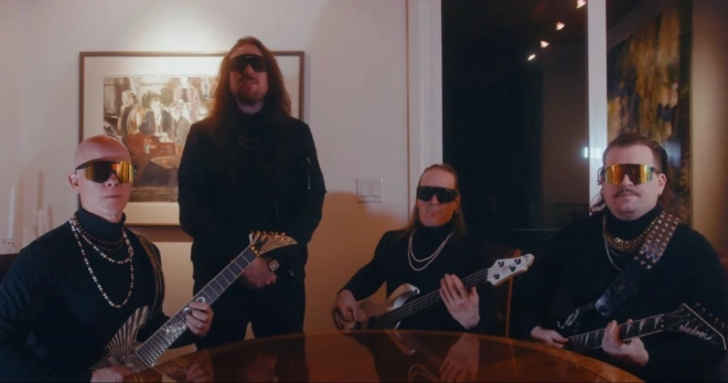 Striker Busts Out The Saxophone And Turtleneck Sweaters For 'Give It All' [Music Video]