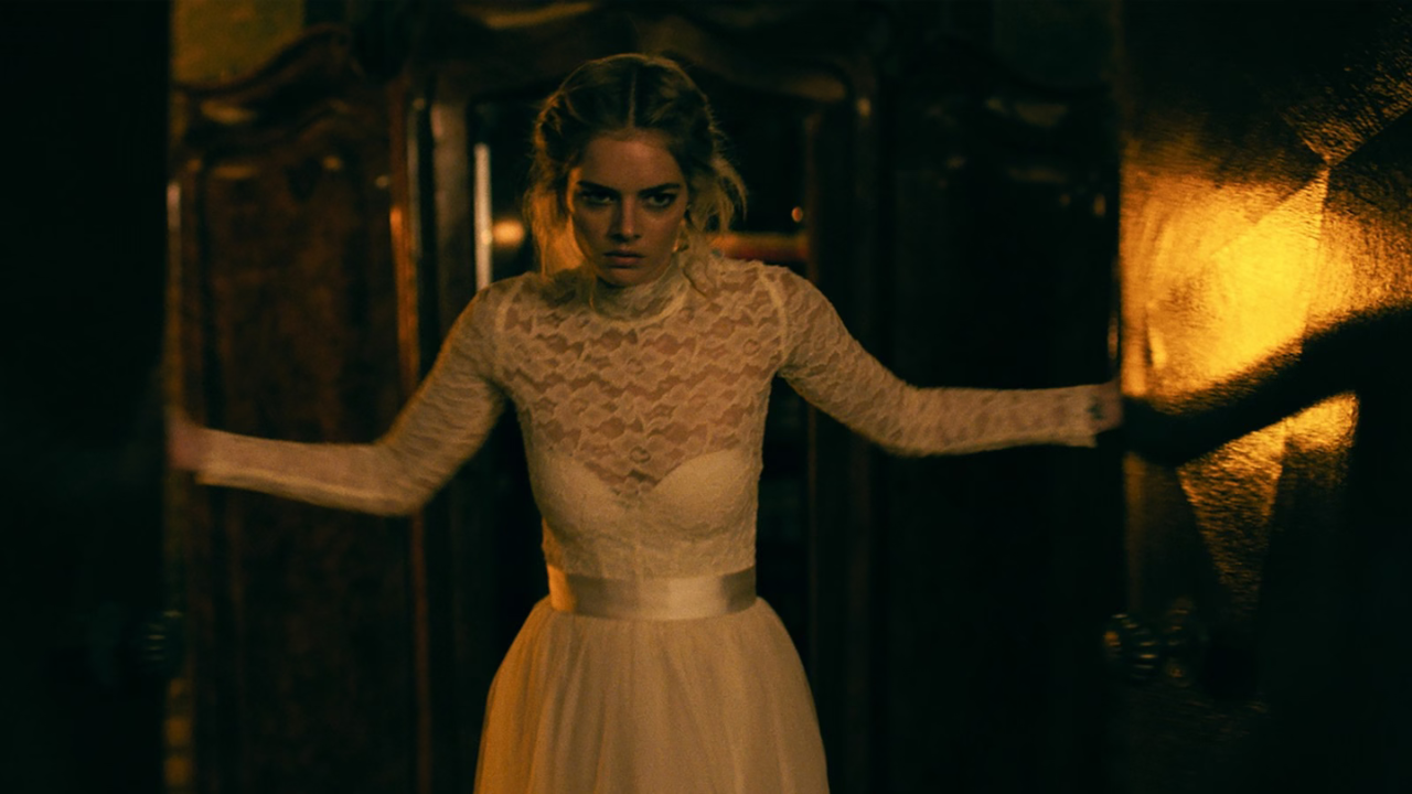 Samara Weaving in Ready Or Not as Grace.