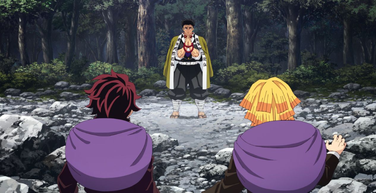 Demon Slayer: Kimetsu no Yaiba - Hashira Training Arc Ep. 6 "The Strongest of the Demon Slayer Corps" screenshot showing Tanjiro and Zenitsu standing in front of a praying Gyomei.