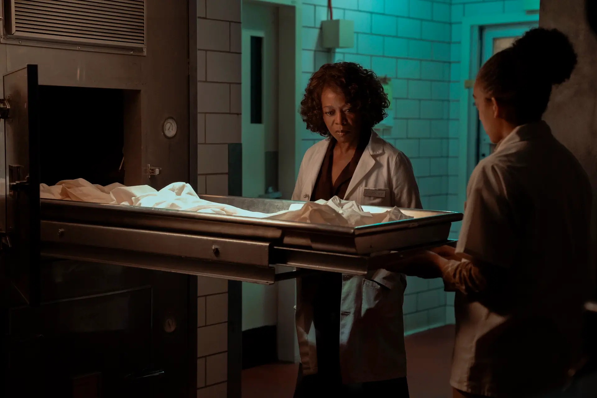 Dr. Cody (Alfre Woodard) examines an empty morgue bed in 'Salem's Lot'
