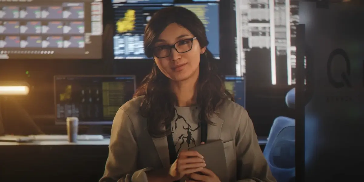 Gemma Chan stands smiling while holding a file in her office in 007 First Light.