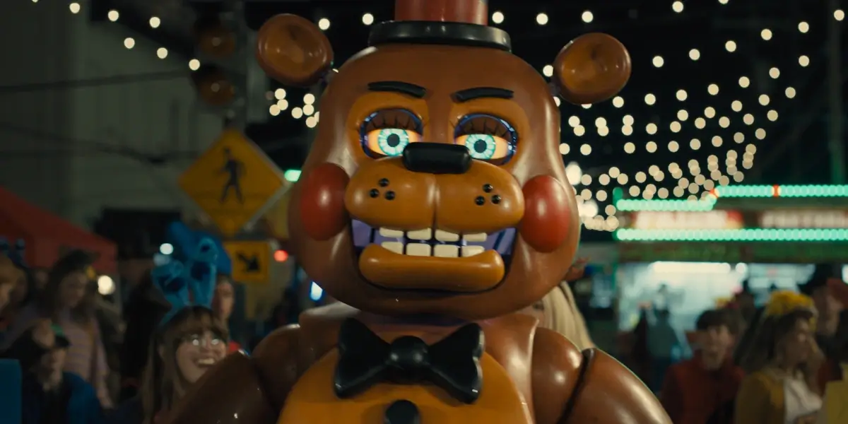 Five Nights At Freddys 2 Toy Freddy Grins In The Middle Of A Crowded Street