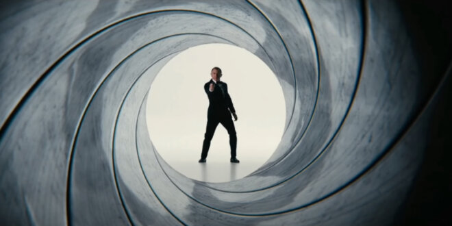 A slightly obscured Daniel Craig draws his gun in the opening gun barrel for No Time To Die.