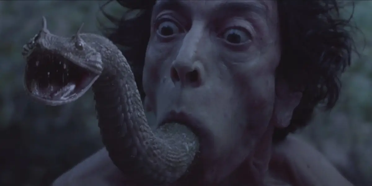 The Carpenters Son A Wide Eyed Man Stands With A Horned Snake Protruding From His Mouth
