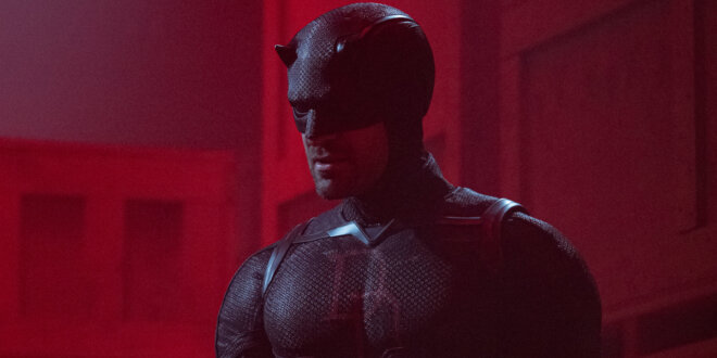 Charlie Cox stands stoically in his red costume at night in Daredevil: Born Again S2.