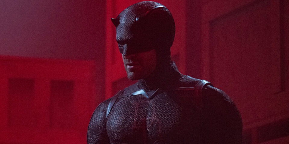 Charlie Cox stands stoically in his red costume at night in Daredevil: Born Again S2.