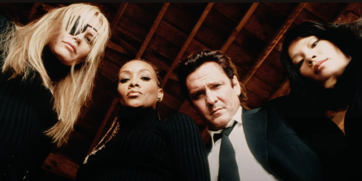 Daryl Hannah Vivica A Fox Michael Madsen and Lucy Liu look down menacingly at the camera in the Kill Bill trailer.