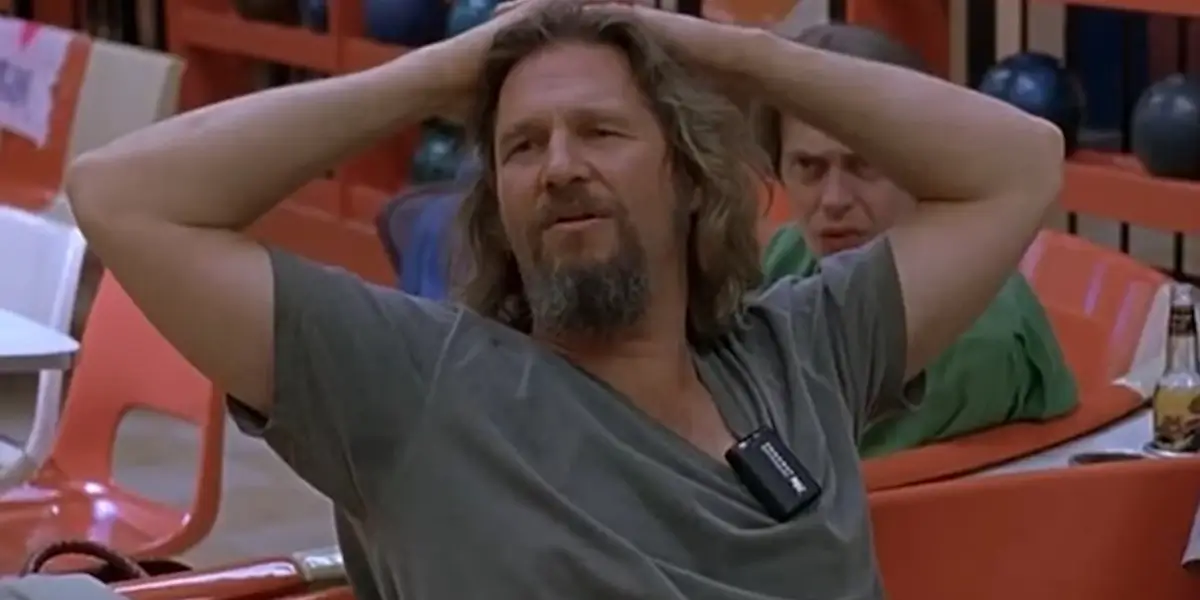 The Big Lebowski Jeff Bridges Sits Back With His Hands On His Head At The Bowling Alley