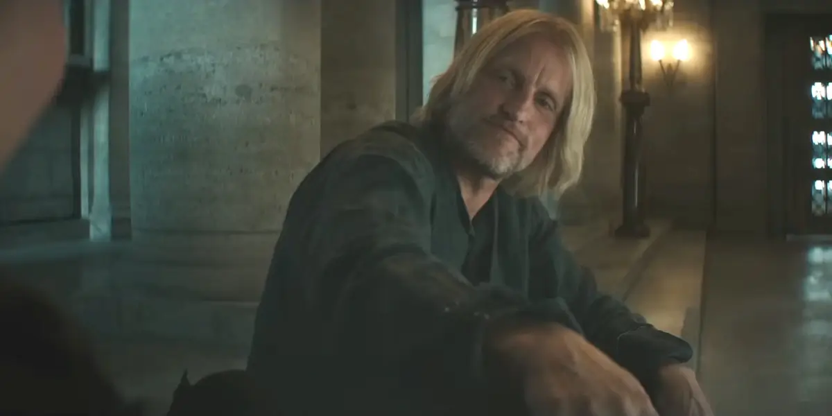 Woody Harrelson smiles reassuringly in The Hunger Games: Mockingjay - Part 2.