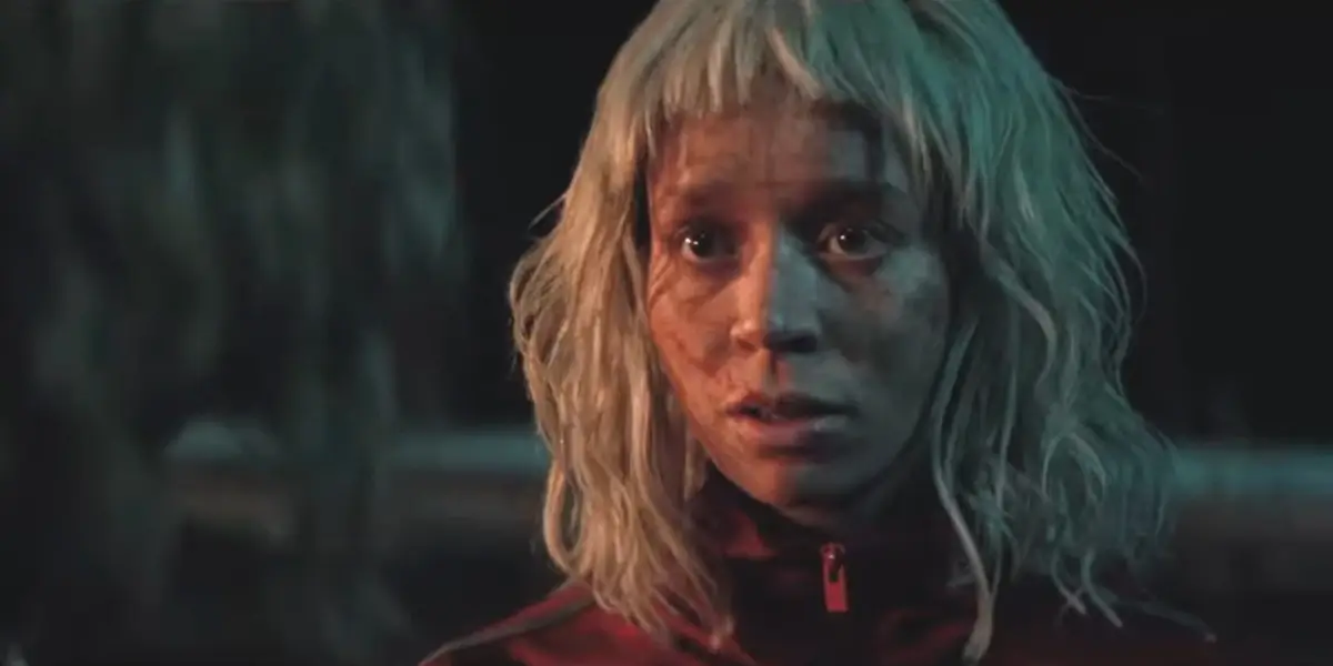 Erin Kellyman looks frightened in the firelight in 28 Years Later: The Bone Temple.
