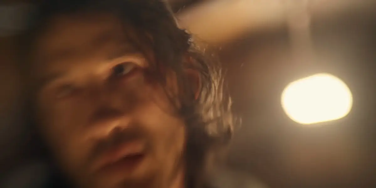 Markiplier looks dazed in a hazy shot in Iron Lung.