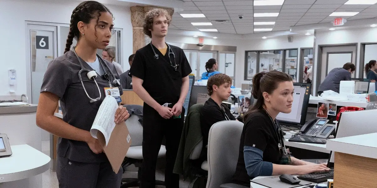Laetitia Hollard, Lucas Iverson, Isa Briones, Gerran Howell all look forward with concern at the nurse's station in The Pitt Season 2.