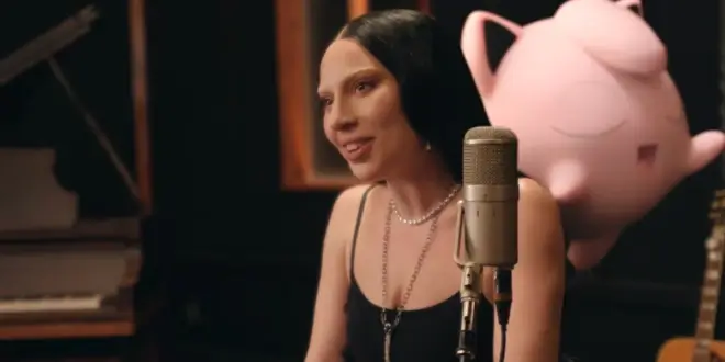 Lady Gaga sits in the studio with Jigglypuff floating behind her in Pokémon 30.