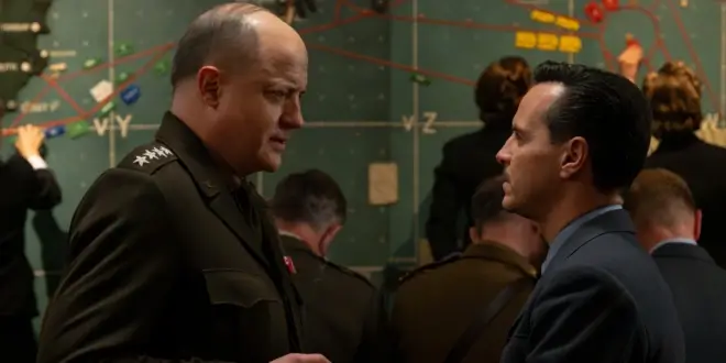 Brendan Fraser looks down at Andrew Scott, as they stand in front of a planning map in Pressure.