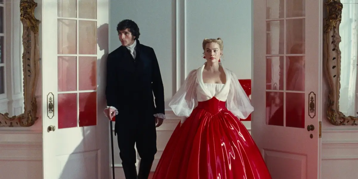Jacob Elordi and Margot Robbie enter a room together in Wuthering Heights.