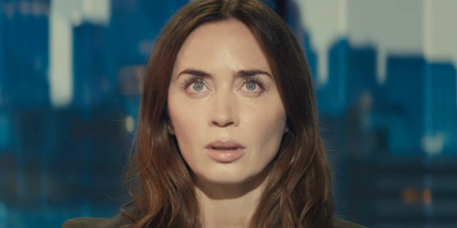 A mesmerized Emily Blunt looks into a bright light in Disclosure Day.