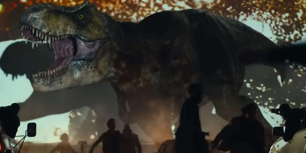 Roberta the T-Rex roars in front of a panicked drive-in crowd in Jurassic World Dominion.