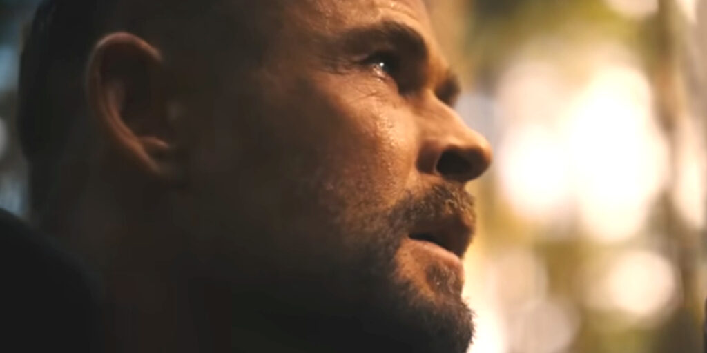 Chris Hemsworth kneels in prayer in the woods in the Avengers: Doomsday teaser.