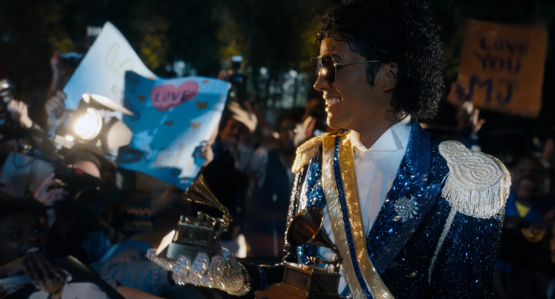 Jaafar Jackson as Michael Jackson accepting a Grammy in 'Michael' (2026).
