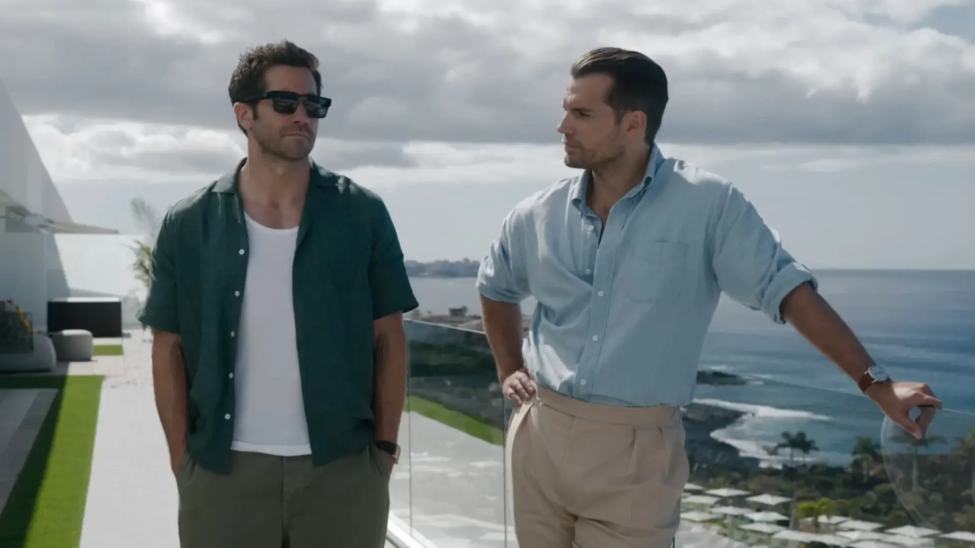 A curious Henry Cavill looks at a concerned Jake Gyllenhaal in In The Grey.