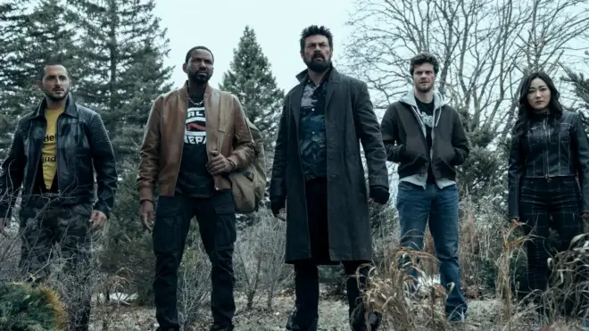 Tomer Capone , Laz Alonso, Karl Urban, Jack Quaid, and Karen Fukuhara stand together and survey a situation in the woods in The Boys Season 5 Episode 4 - "King of Hell."