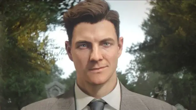 Patrick Gibson wryly smiles in a grey suit. while standing in a cemetery, in 007 First Light's ending.