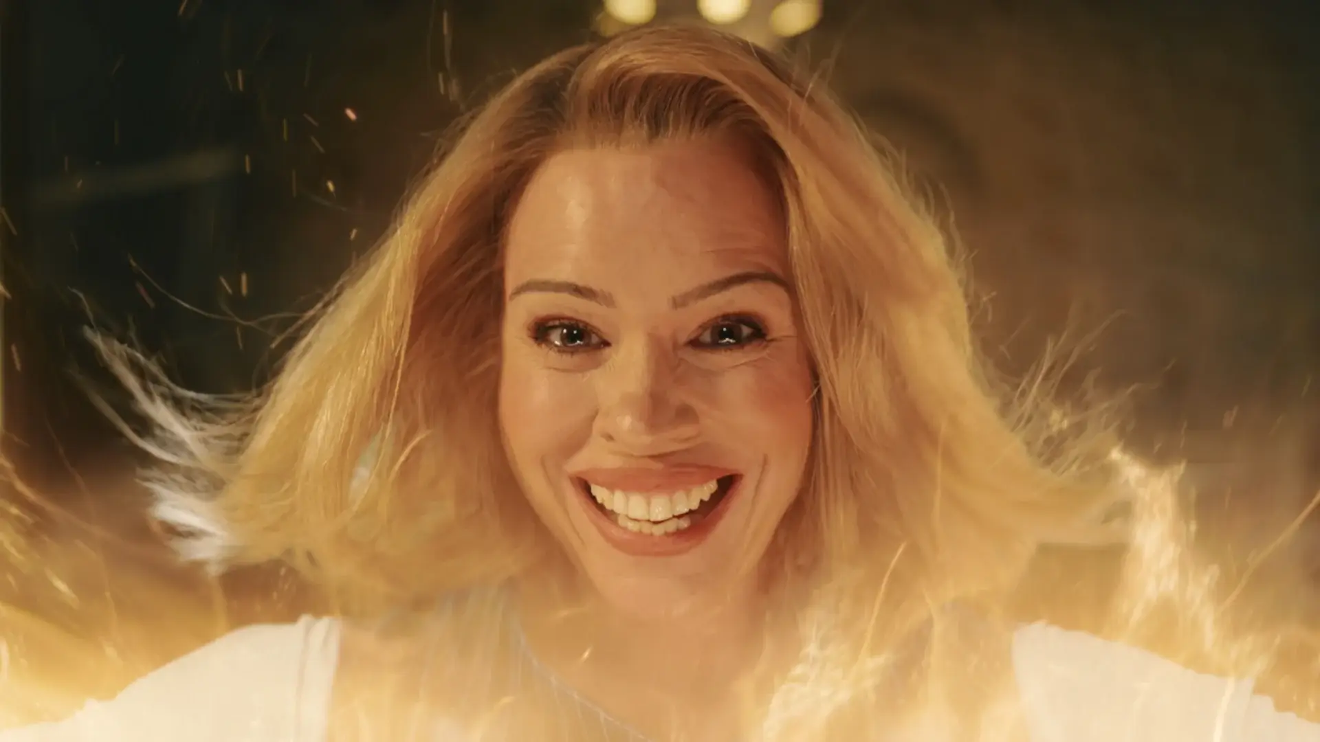 Billie Piper smiles infectiously while bathed in the light of regeneration energy in Doctor Who, Season 15 Episode 8 - "The Reality War,"