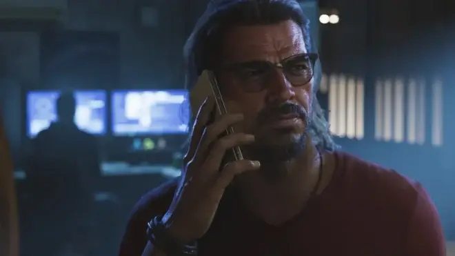 Raul Bautista takes a phone call in a bar in Grand Theft Auto VI.