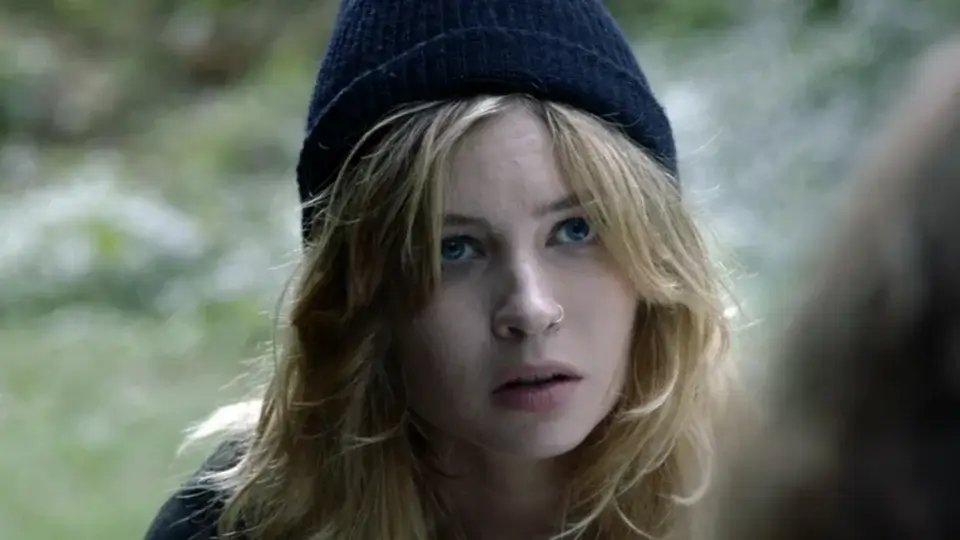 Daveigh Chase sits outside with a look of concern in Jack Goes Home.