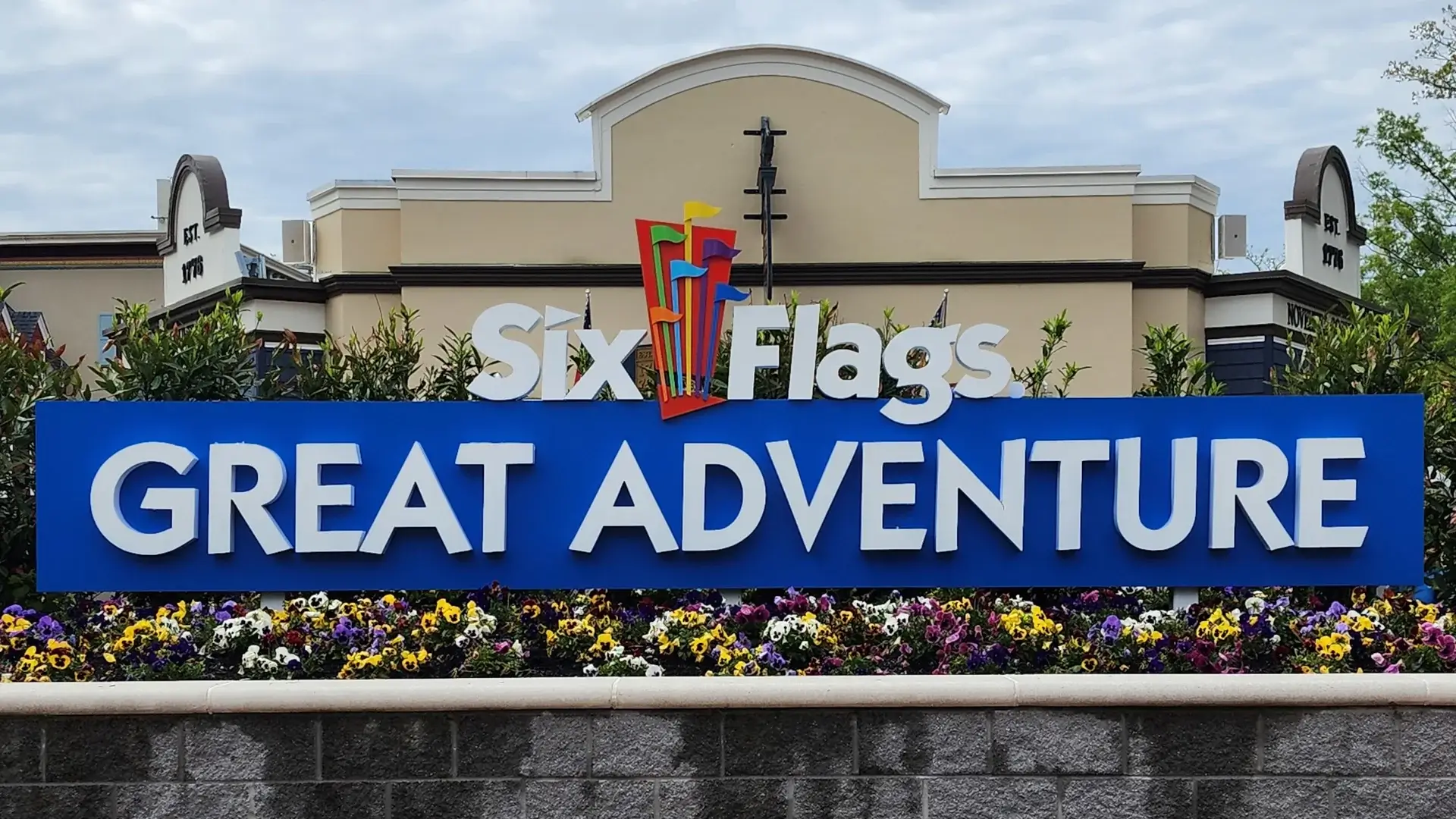Six Flags Great Adventure's modern logo signage, shown at the park's entrance.