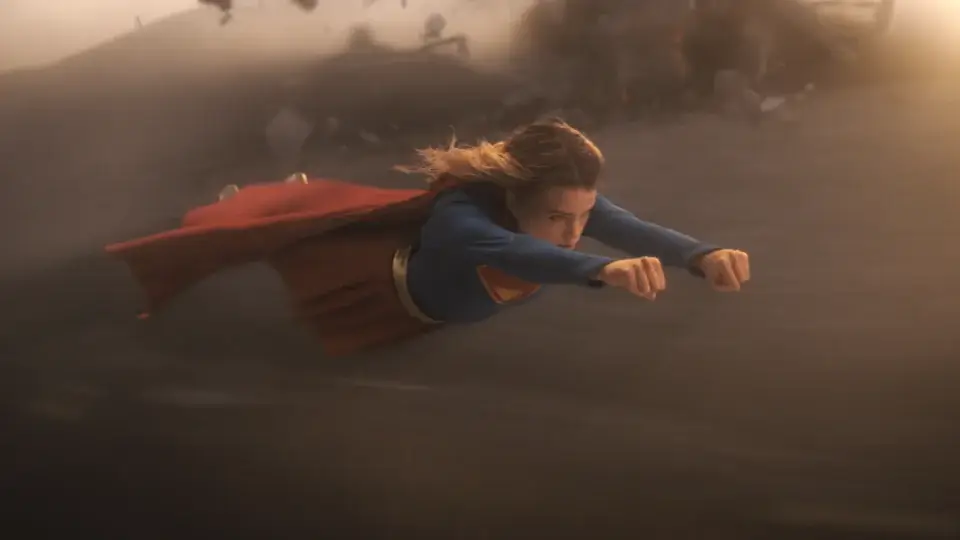 A determined Milly Alcock soars through the air in Supergirl.