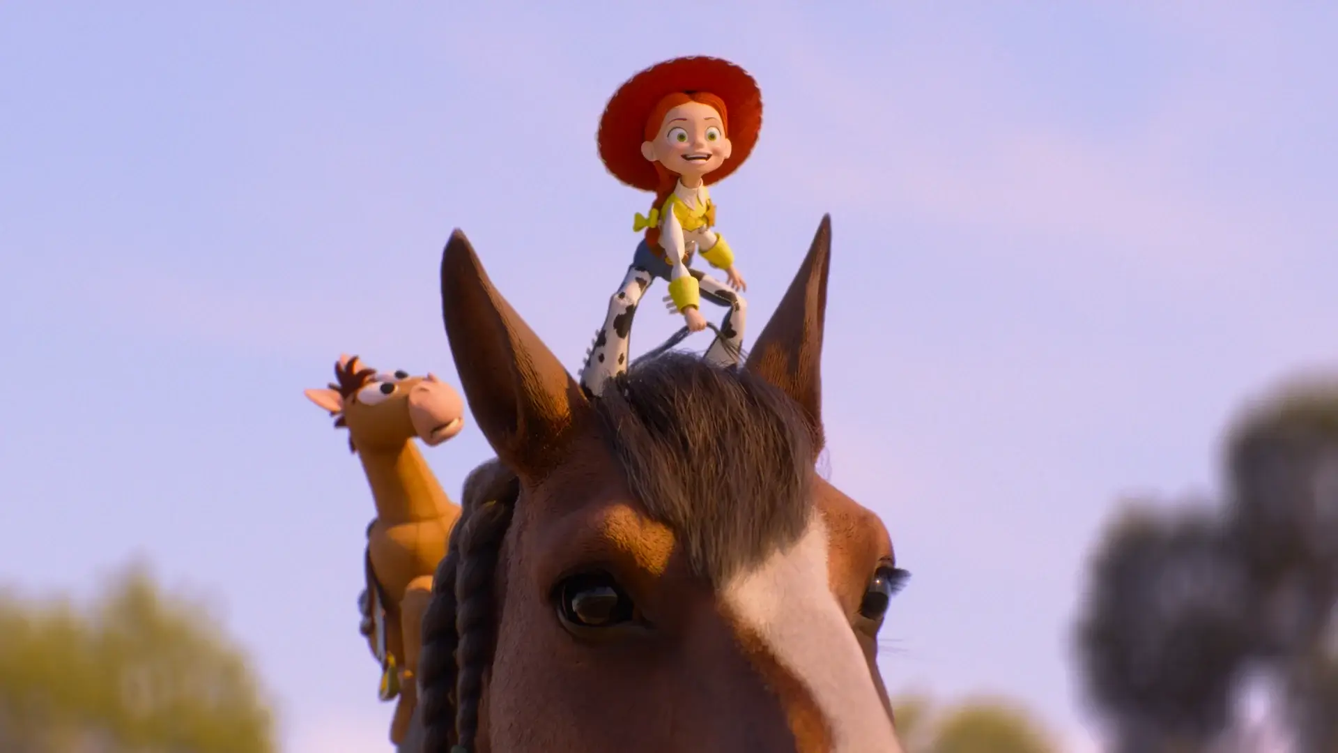 Jessie happily sits atop a horse with Bullseye during a daytime ride in Toy Story 5.