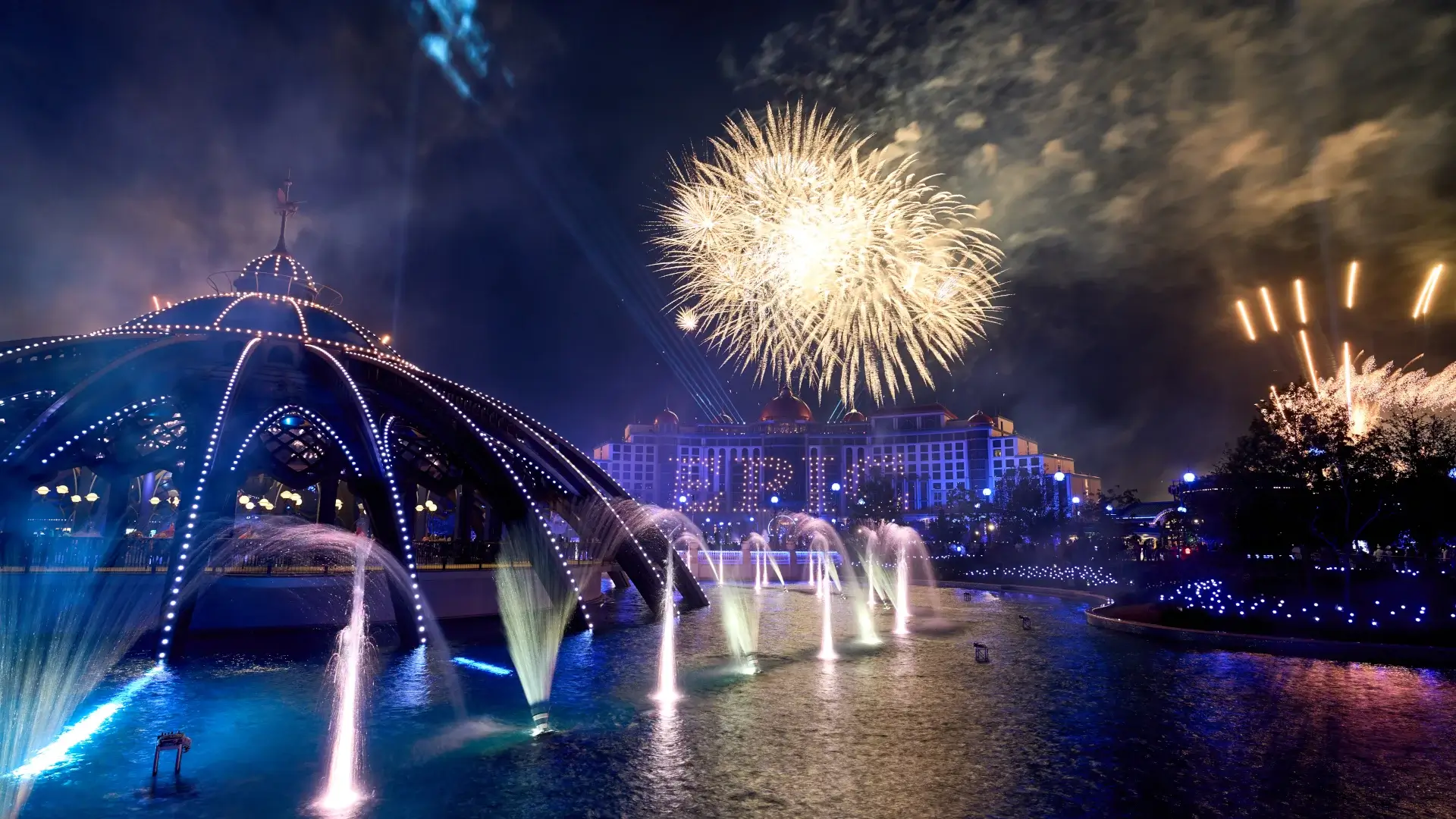 Fireworks explode, and a drone show spells out Epic, during Universal Celestial Goodnight at Universal Epic Universe.