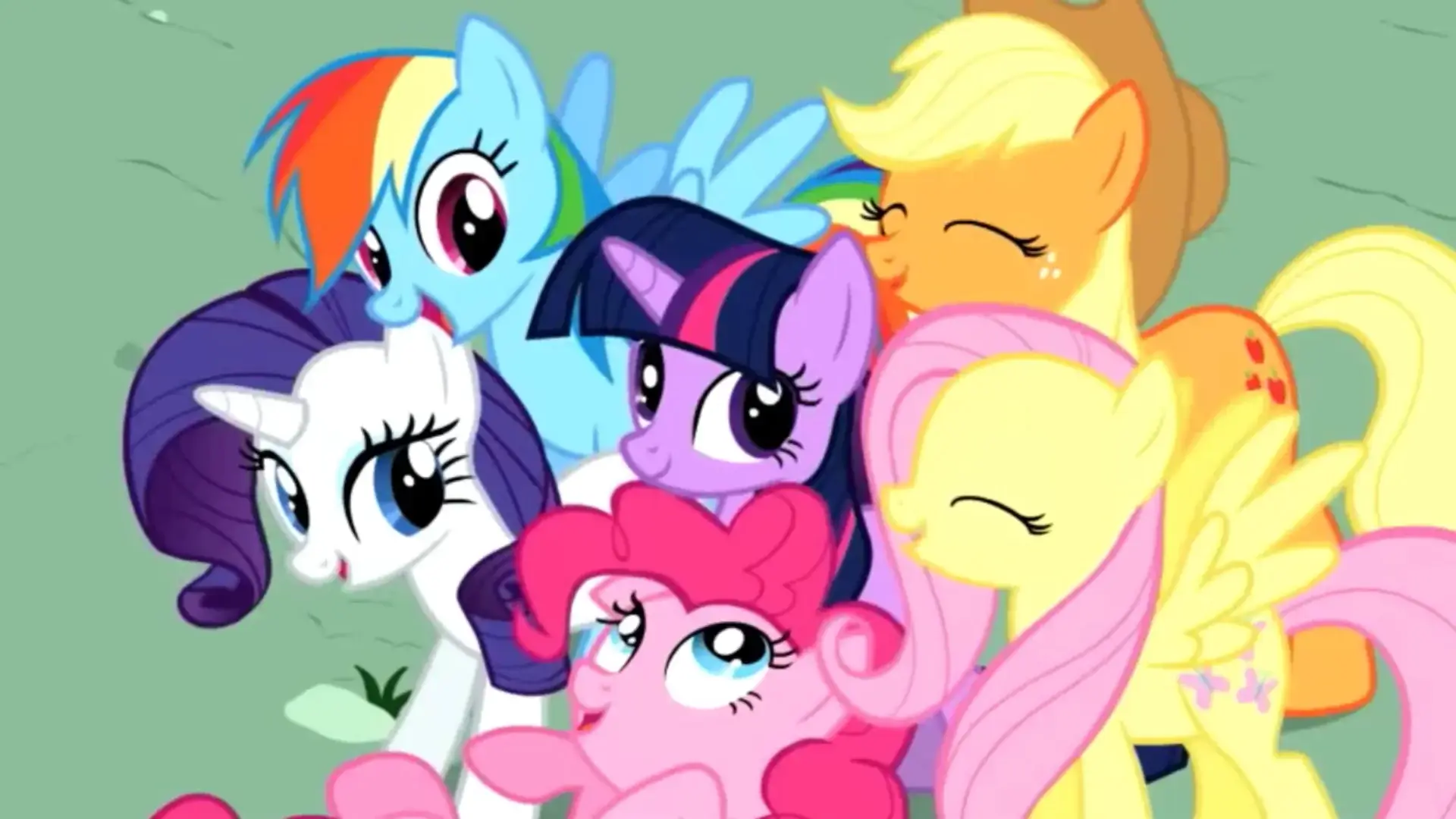 The Mane Six pictured together smiling in the opening to My Little Pony: Friendship is Magic!
