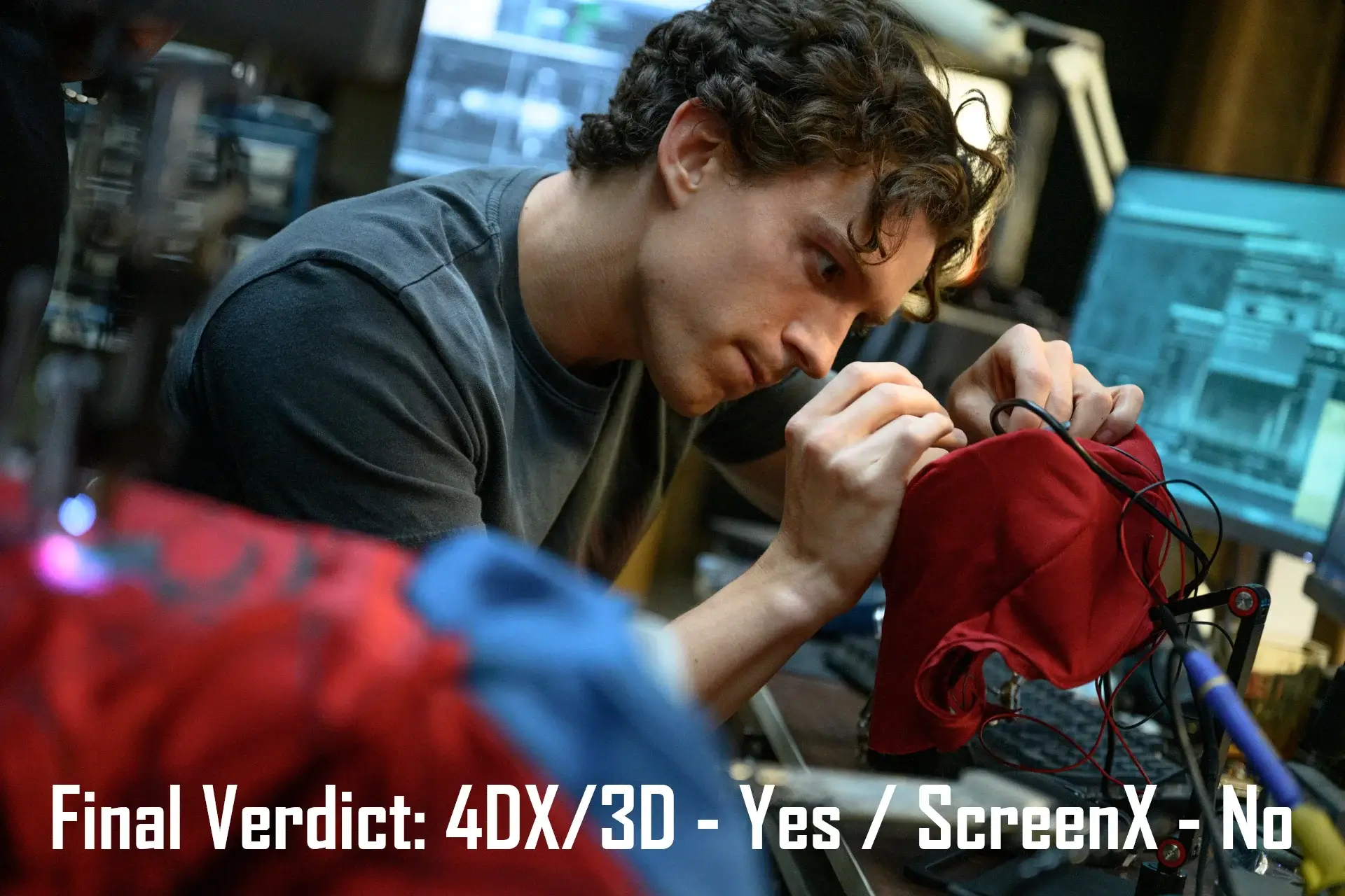 Tom Holland sits at a workbench tinkering with his goggles in Spider-Man: Brand New Day.