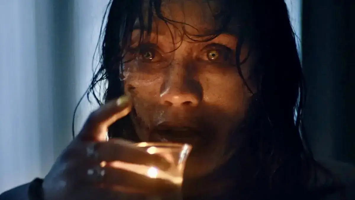The infamous candle wax scene in Evil Dead Burn.