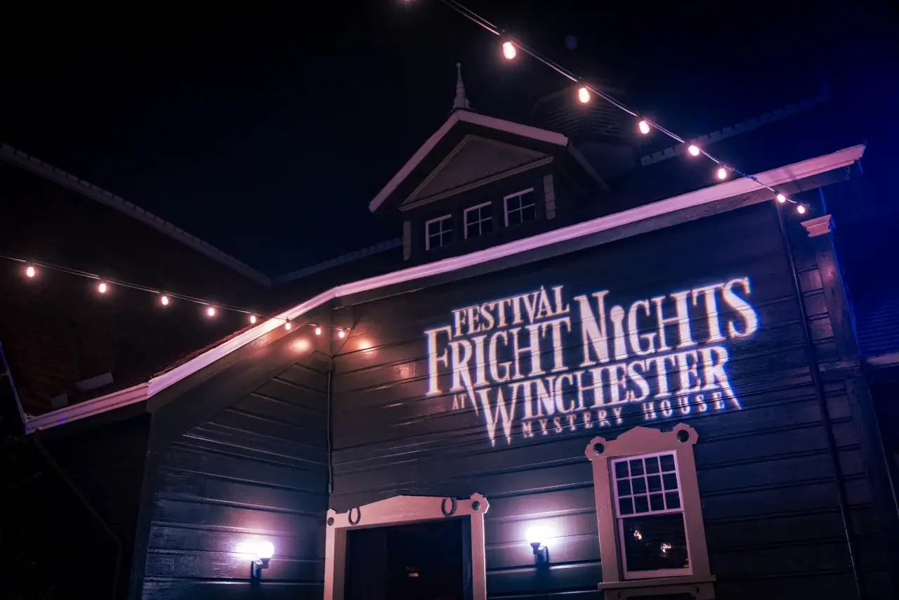 The Winchester Mystery House at night.