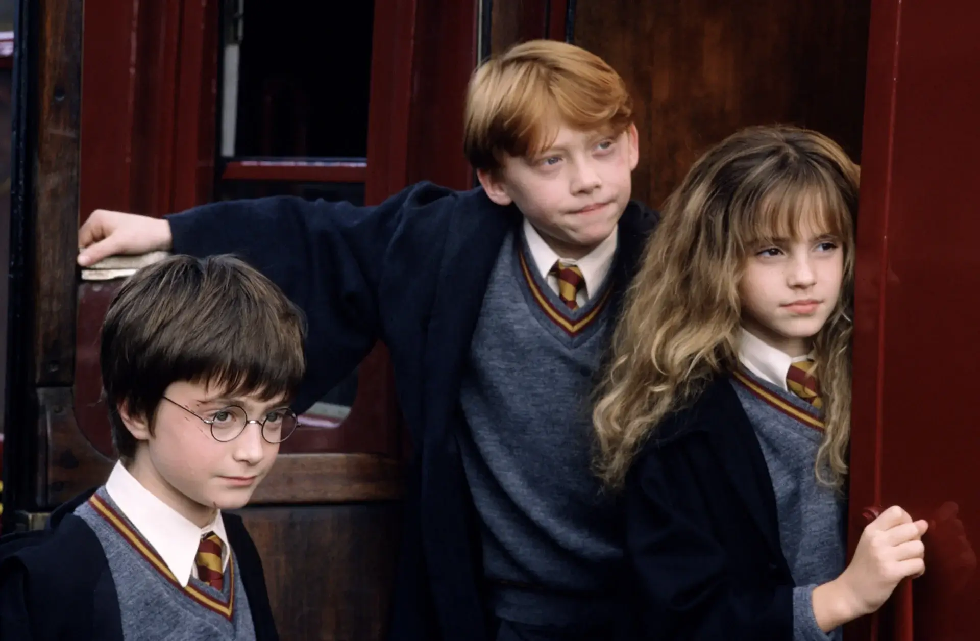 three kids on a train