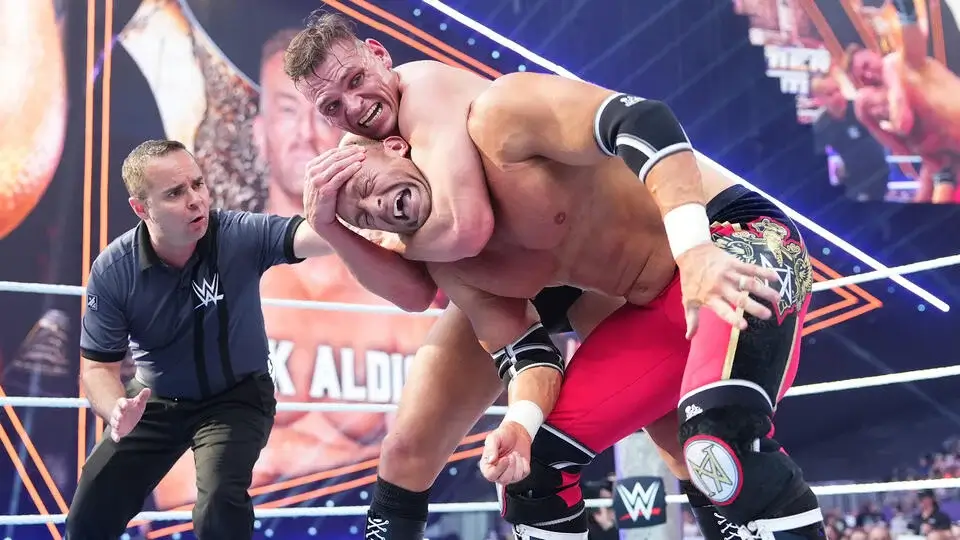 Gunther and Nick Aldis wrestle at Summerslam.