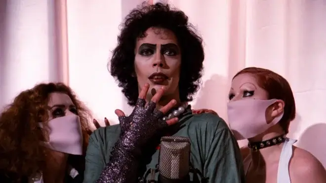 man with pearls gasping