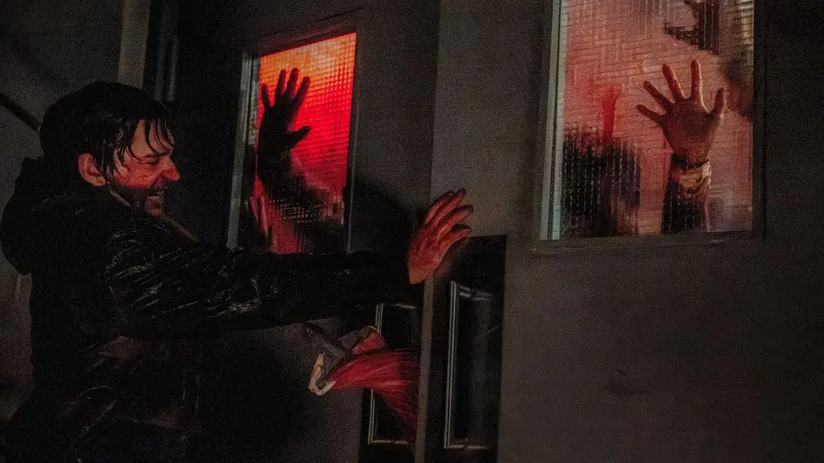 Bryan fighting off monsters in Resident Evil.