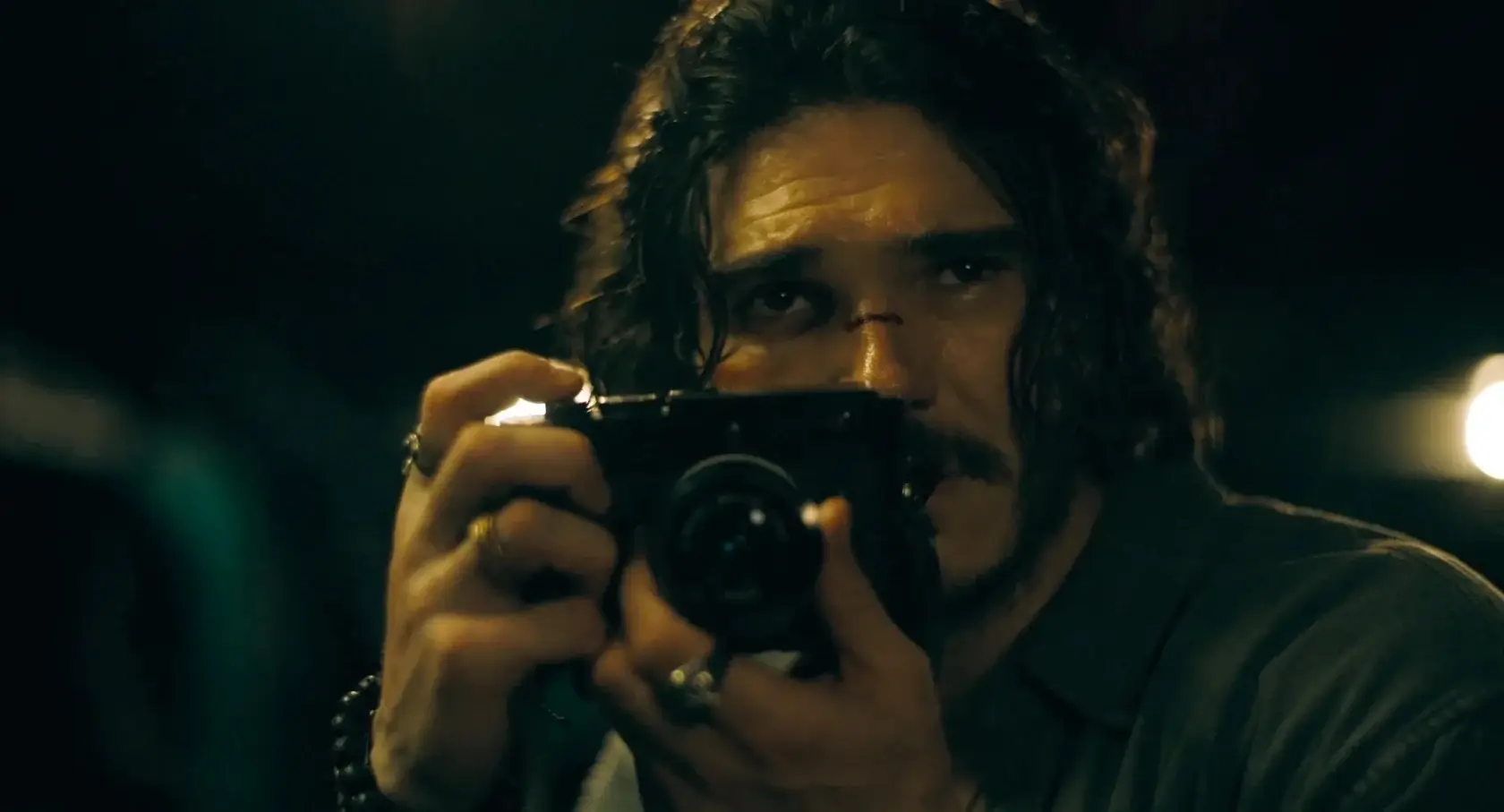 Man holding camera.