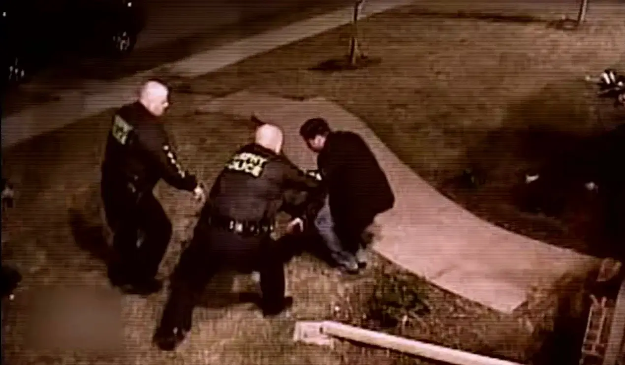 Police arresting someone on To Catch A Predator.
