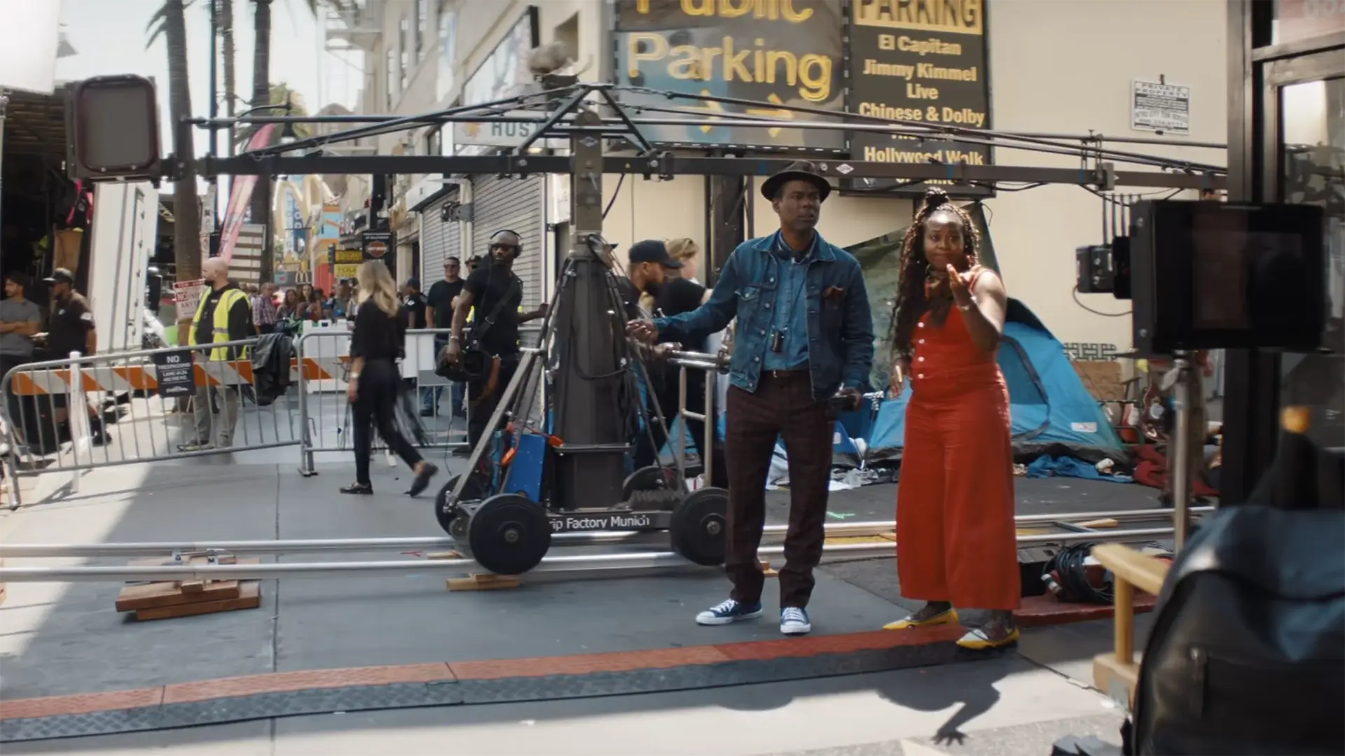 Two people looking around a film set.