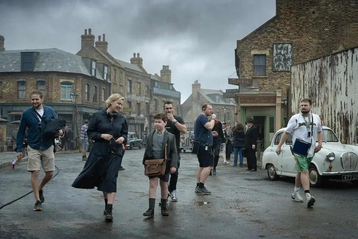Folks walking in a city.