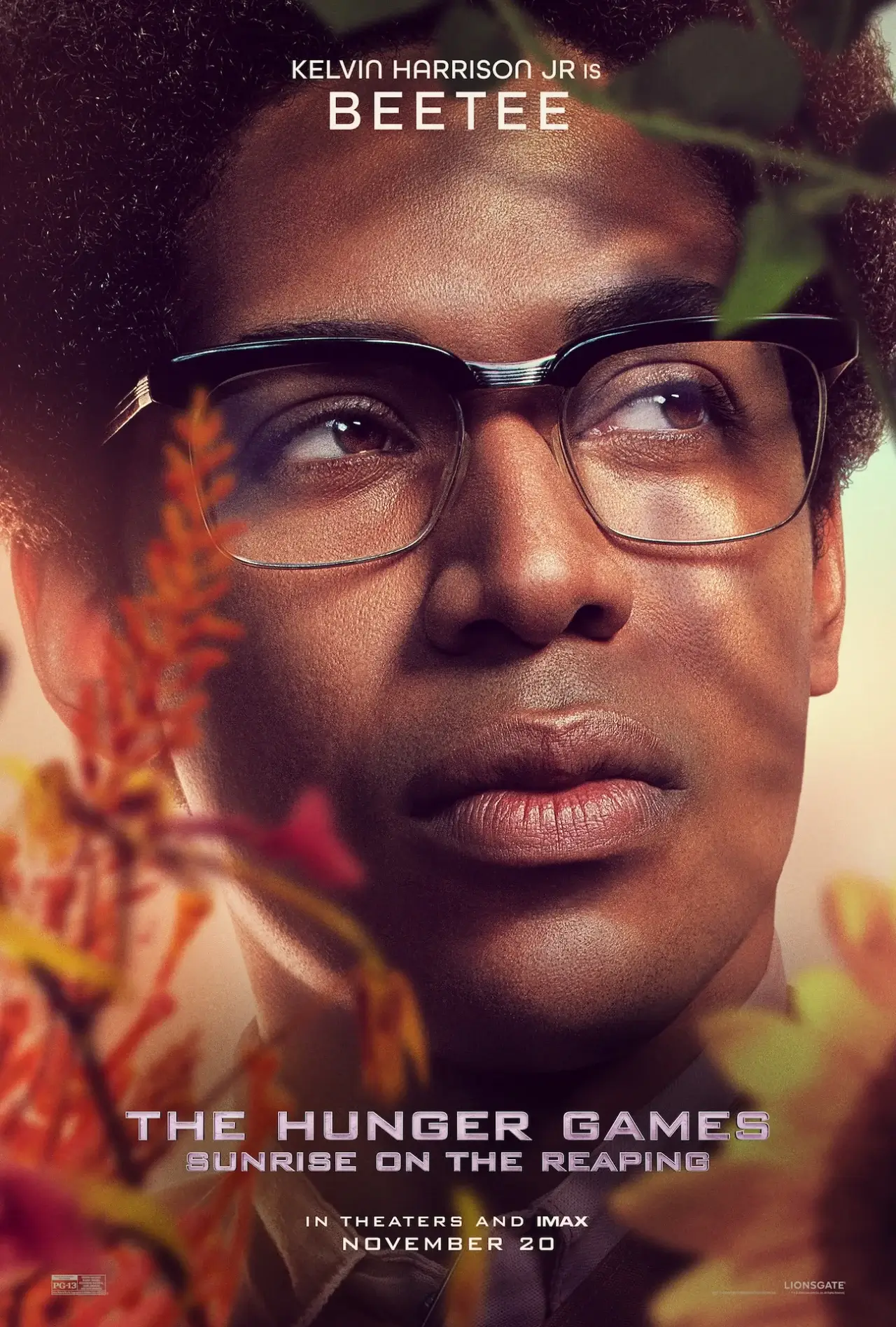 Man with glasses in flowers.
